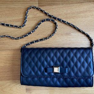 black quilted clutch with chain strap